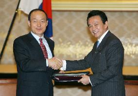 Japan, S. Korea formalize legal assistance treaty