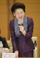 Wife of Japan's ex-premier speaks at meeting on maternity book