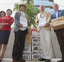 Campaigners deliver petition demanding security bills be retracted