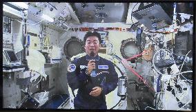 Japanese astronaut Yui talks to press from ISS