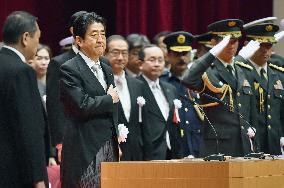 Abe vows beef-up of defense, calls N. Korea missiles "serious threat"