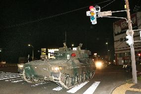 Combat vehicles run on public road
