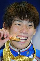 Yoshida, Sakamoto win gold at world championships