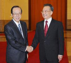 Fukuda, Wen agree to cooperate in enhancing bilateral relations