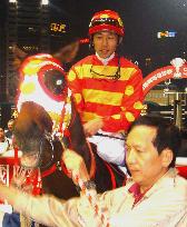 Take becomes 1st Japanese to win 100 races abroad