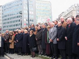 EU officials observe a moment of silence