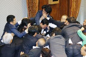 Controversial Japan security bills clear upper house panel