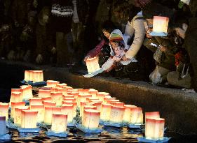 Lantern floating on eve of tsunami anniv.