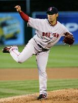 Red Sox Matsuzaka rolls over Athletics for 1st season win