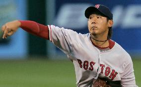 Red Sox Matsuzaka rolls over Athletics for 1st season win