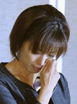 Actress Sakai offers tearful apology