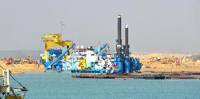 Dredging, drilling under way to expand part of Suez Canal