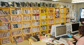 Numerous photos found in quake debris await owners in northern Japan