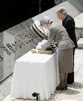 Emperor, Empress offer floral tribute to WWII sailor victims