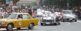 80 famed cars motorcade in downtown Tokyo