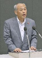 Tokyo governor steps down over political funds scandal