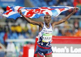 Olympics: Farah wins men's 10,000