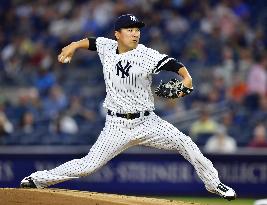 Baseball: Tanaka earns 12th win as Yankees beat Orioles