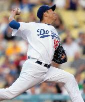 Kuroda shines against Cardinals