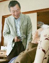 Doctor prescribing treatment of patients at home, hospices
