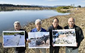 Fukushima's former salmon fishermen look dejected