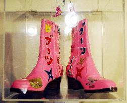 Pink boots displayed in memory of late Japanese rock singer