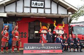 Western Japan rail station adorned in red in honor of feudal warlord