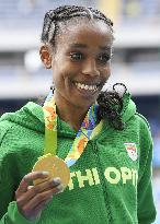 Ethiopia's Ayana wins women's 10,000-meter gold with world record