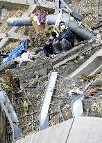 Father, son in quake-hit Onagawa