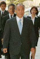 Ex-lawmaker Suzuki gets 2-year prison term