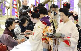 Geisha welcome visitors to plum blossom festival