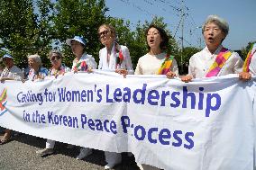 Female activists cross DMZ on Korean Peninsula