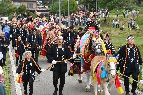 Brightly decorated horses parade at festival in northeastern Japan