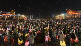 N. Korea celebrates rocket launch with dance party, fireworks
