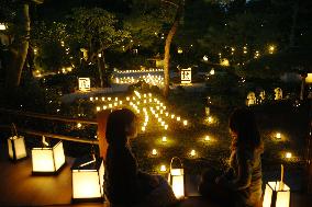 Kyoto temple garden lit by 420 candles