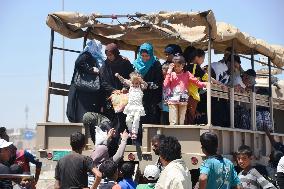 Refugees return to western Mosul