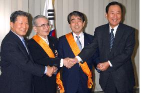 S. Korea confers sports order on 2 Japanese soccer officials