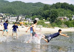 Tsunami-hit Iwate beach reopens after 3 years of cleanup