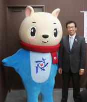 Sapporo mayor stands next to 2017 Asian Winter Games mascot