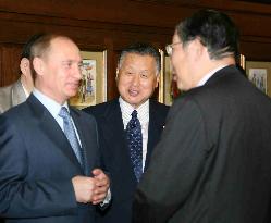 Putin meets with Mori, Okuda