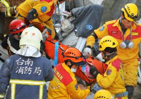 Girl rescued from collapsed apartment complex in Taiwan