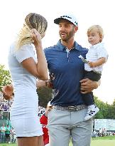 Johnson celebrates with partner, son after winning U.S. Open
