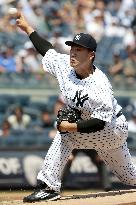 Tanaka earns 9th win as Yankees outslug Rays