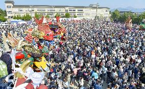 Colorful floats paraded at festival in southwestern Japan