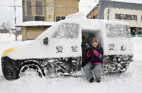 Snow sculpture of police car unveiled in Hokkaido town