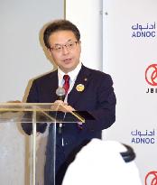 Japan economy minister in Abu Dahbi