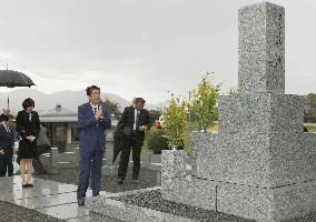 Japan PM Abe visit to father's grave