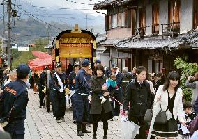 People pull carriage as part of temple festival in western Japan