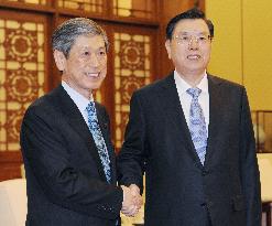 LDP deputy head meets 3rd-ranked Chinese politician in Beijing