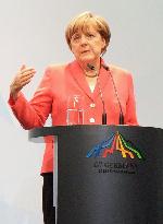 Merkel attends post-summit press conference